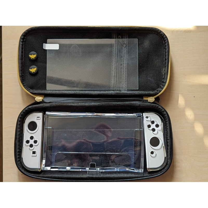 Захисний мегакомплект Zelda сумка для Nintendo Switch OLED/Yellow + Бампер XZT + 2 накладки + Захисне скло Захисний мегакомплект Zelda сумка для Nintendo Switch OLED/Yellow + Бампер XZT + 2 накладки + Захисне скло